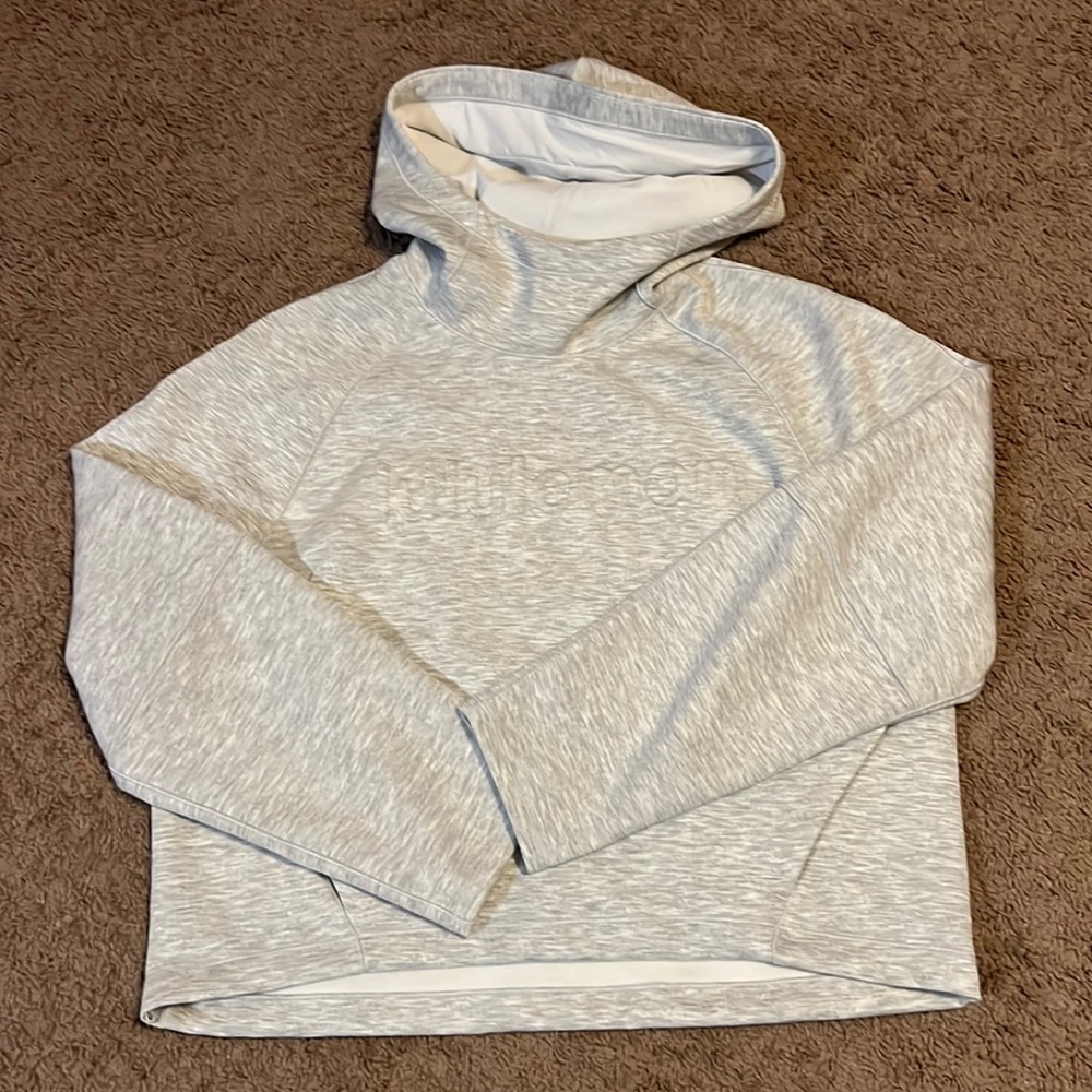 LuLuLemon Airwrap Hoodie with Emboss word mark.